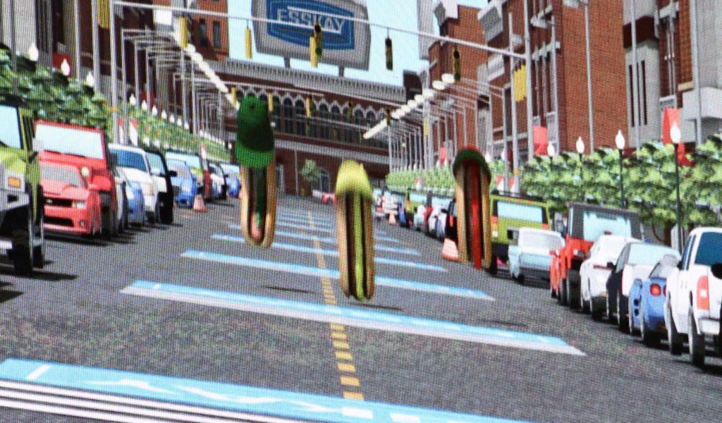 Hotdogs Ketchup, Relish, and Mustard racing to the ballpark